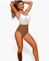 Beach Rose Co. one-piece swimsuit with a white, beige, and brown color block design, U-neckline, and scalloped trim.