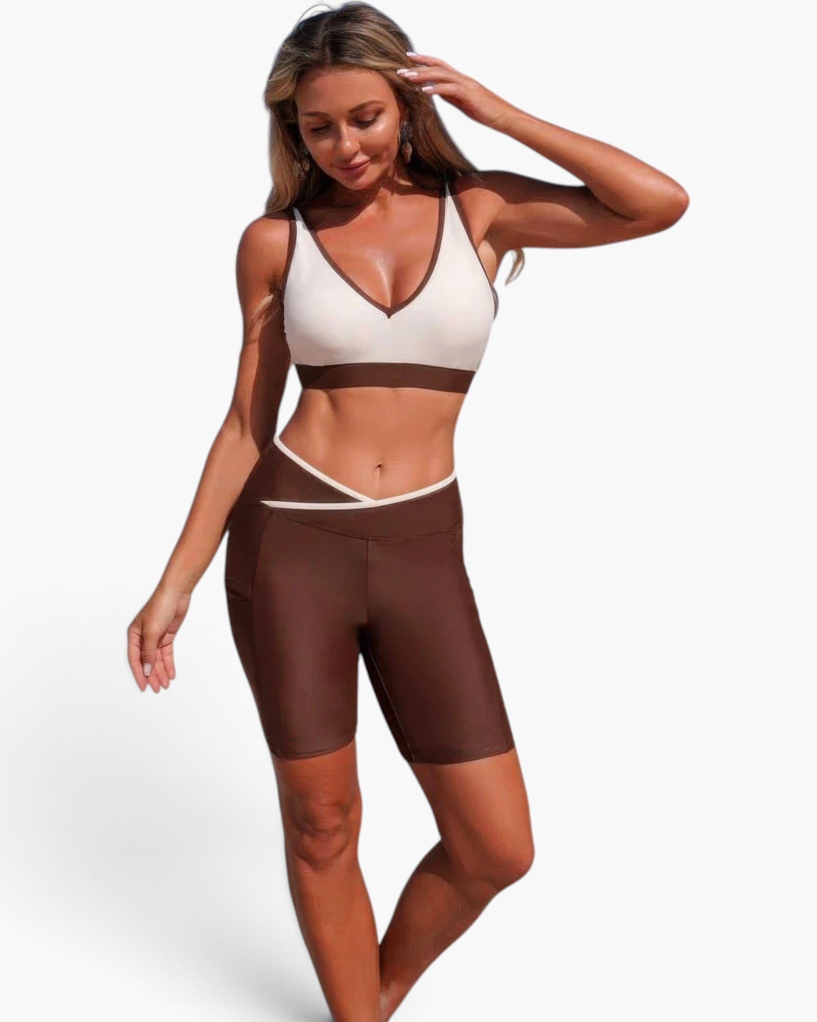 Beach Rose Co. two-piece color block yoga set with a sleeveless sports bra and brown biker shorts in stretch fabric.