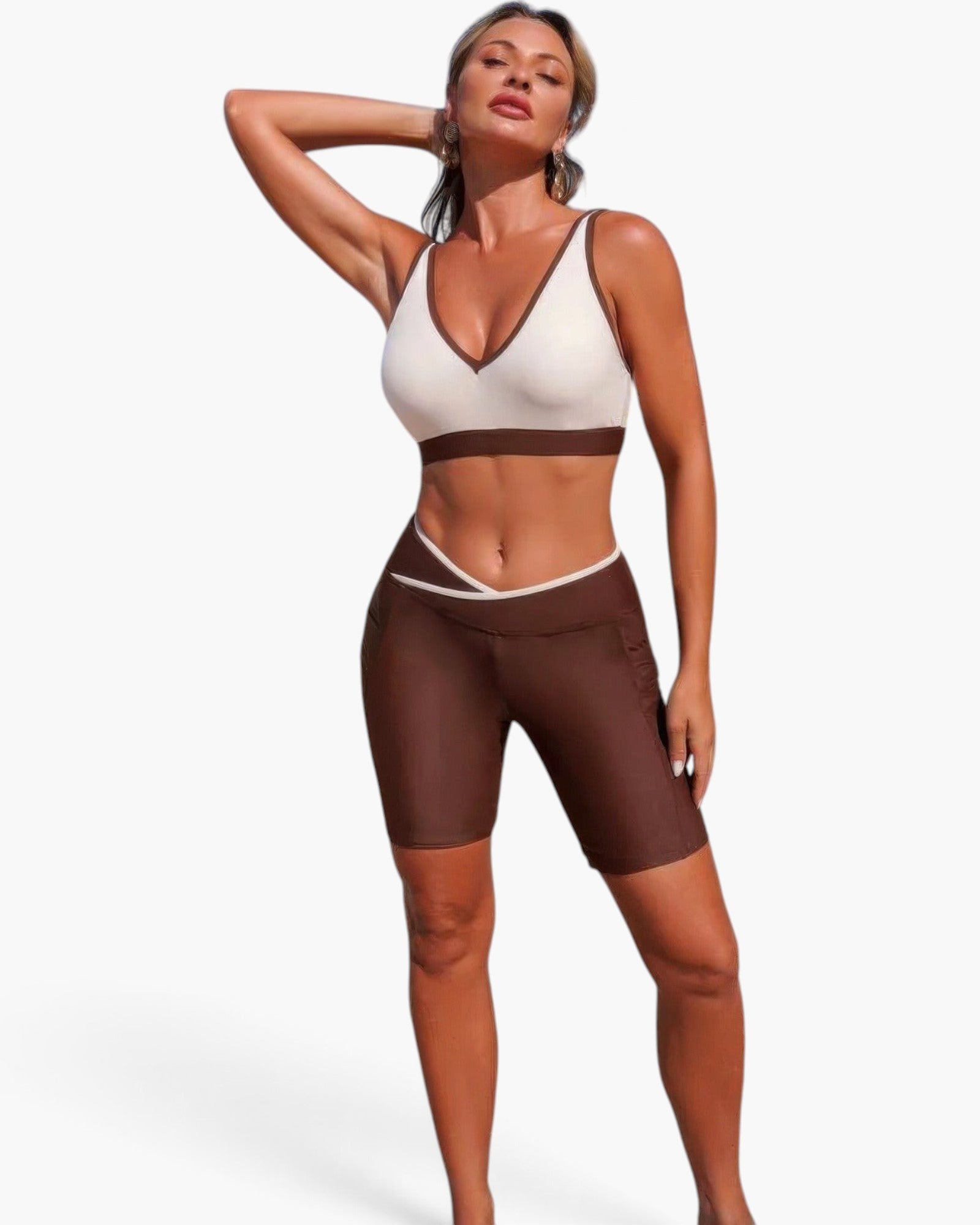 Beach Rose Co. two-piece yoga set with a cream and brown color block sports bra and matching high-waisted biker shorts.