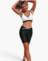 Beach Rose Co. two-piece yoga set with a white and black color block sports bra and matching high-waisted shorts.