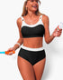 Beach Rose Co. two-piece colorblock bikini with a black and white sleeveless top and high-waisted bottoms.
