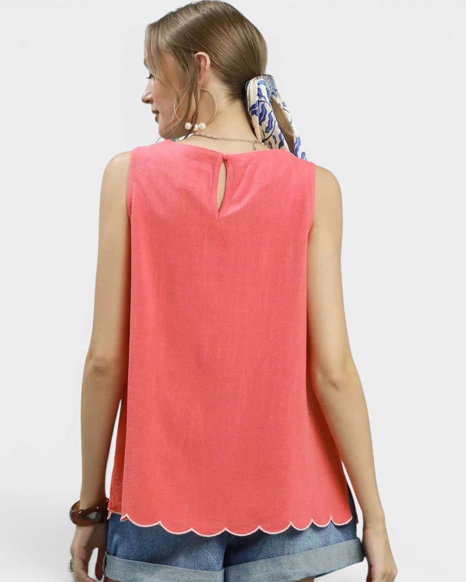 Beach Rose Co. coral linen-cotton blend tank top with white floral embroidery and scalloped hem. Sleeveless with back keyhole.