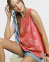 Beach Rose Co. coral linen-cotton blend tank top with white floral embroidery and scalloped hem.