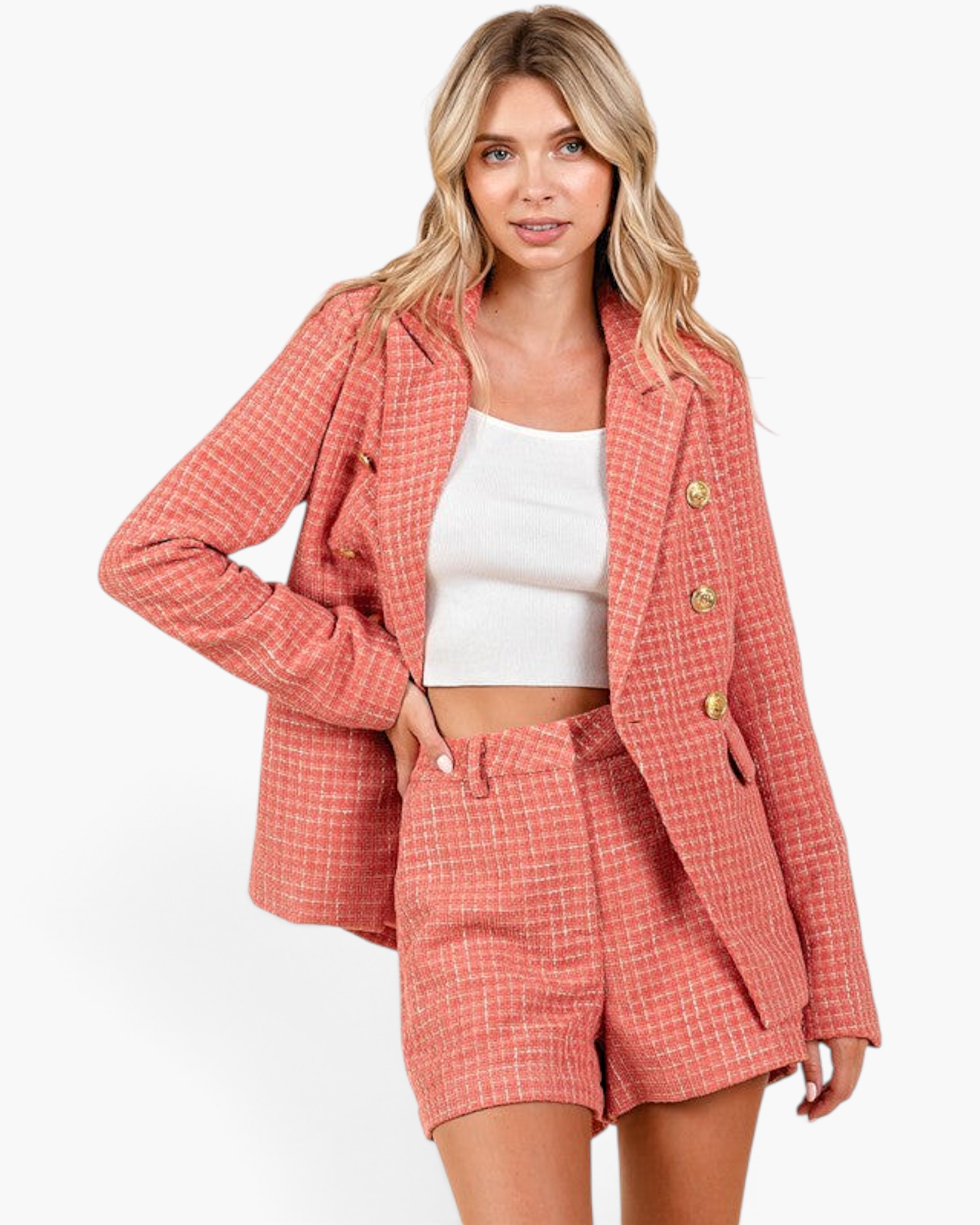 Beach Rose Co. coral textured high-waist shorts and matching blazer worn by a blonde model with a white crop top.