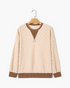 Beach Rose Co. cream sweatshirt with a raised checkered texture, brown contrast trim, and a decorative neck insert.
