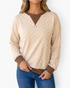 Beach Rose Co. cream sweatshirt with raised checkered texture, brown contrast trim, and triangle neckline detail.