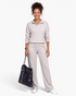 Beach Rose Co. cream two-piece set with a collared pullover and wide-leg pants in soft polyester knit.
