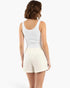 Beach Rose Co. Essential Cotton Comfort Shorts in cream, featuring a relaxed fit and elastic waistband, back view.