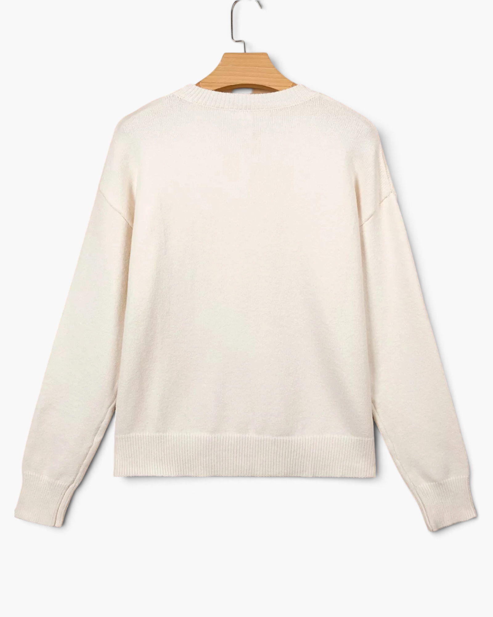 Beach Rose Co. cream knit sweater with ribbed trim and dropped shoulders, back view.