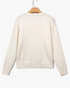 Beach Rose Co. cream knit sweater with ribbed trim and dropped shoulders, back view.
