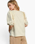 Beach Rose Co. cream knit jacquard top with puff sleeves and pearl embellishments on the shoulders