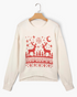 Beach Rose Co. cream knit sweater featuring a red reindeer, tree, and snowflake pattern with a crew neckline.