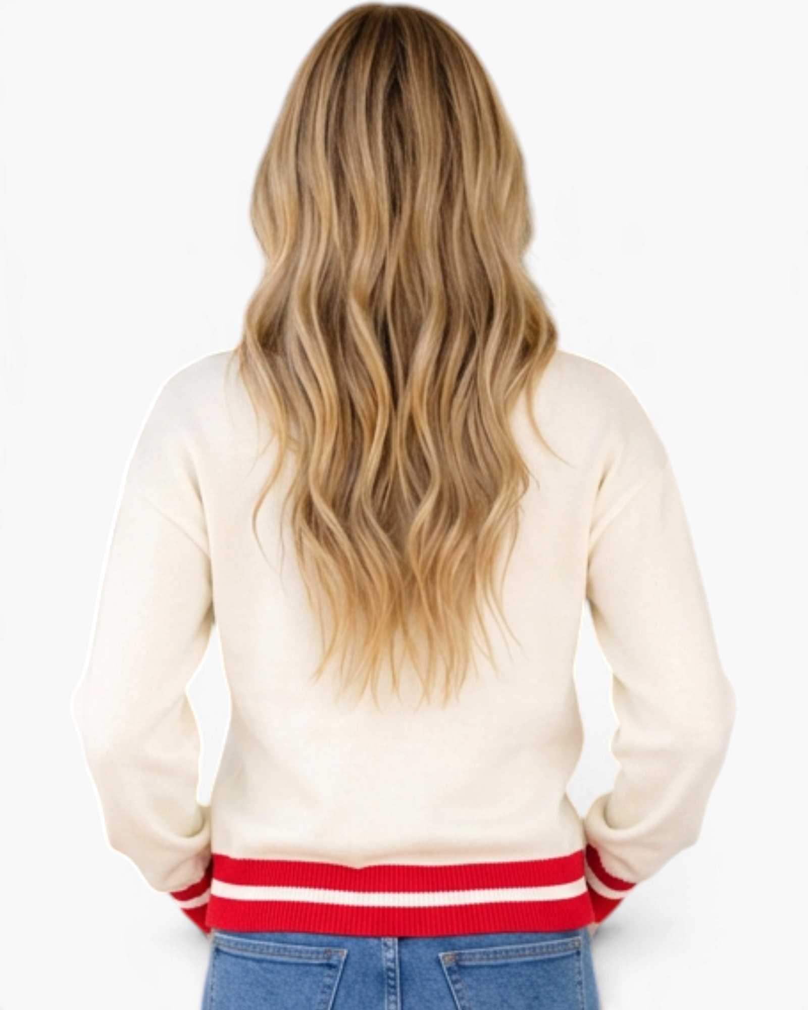 Beach Rose Co. cream sweater with red striped hem worn by a woman with long blonde hair, back view
