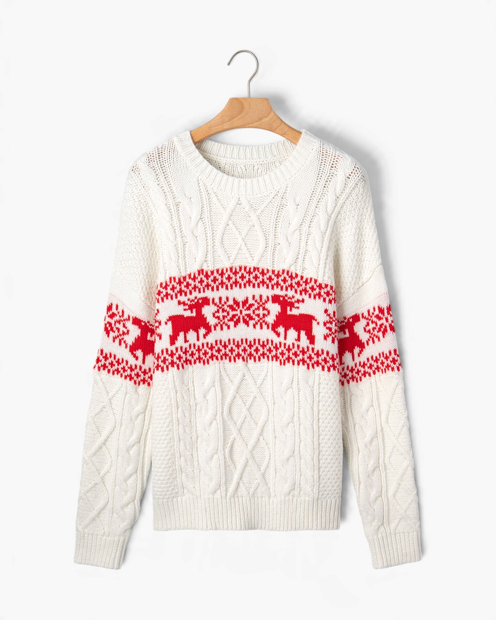 Beach Rose Co. cream cable knit sweater featuring red reindeer and snowflake holiday motifs on a wooden hanger.