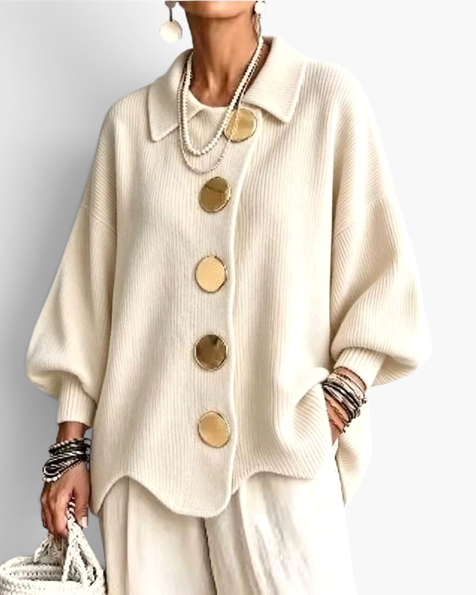Beach Rose Co. cream ribbed knit cardigan with a collared neckline, balloon sleeves, and large gold button details.