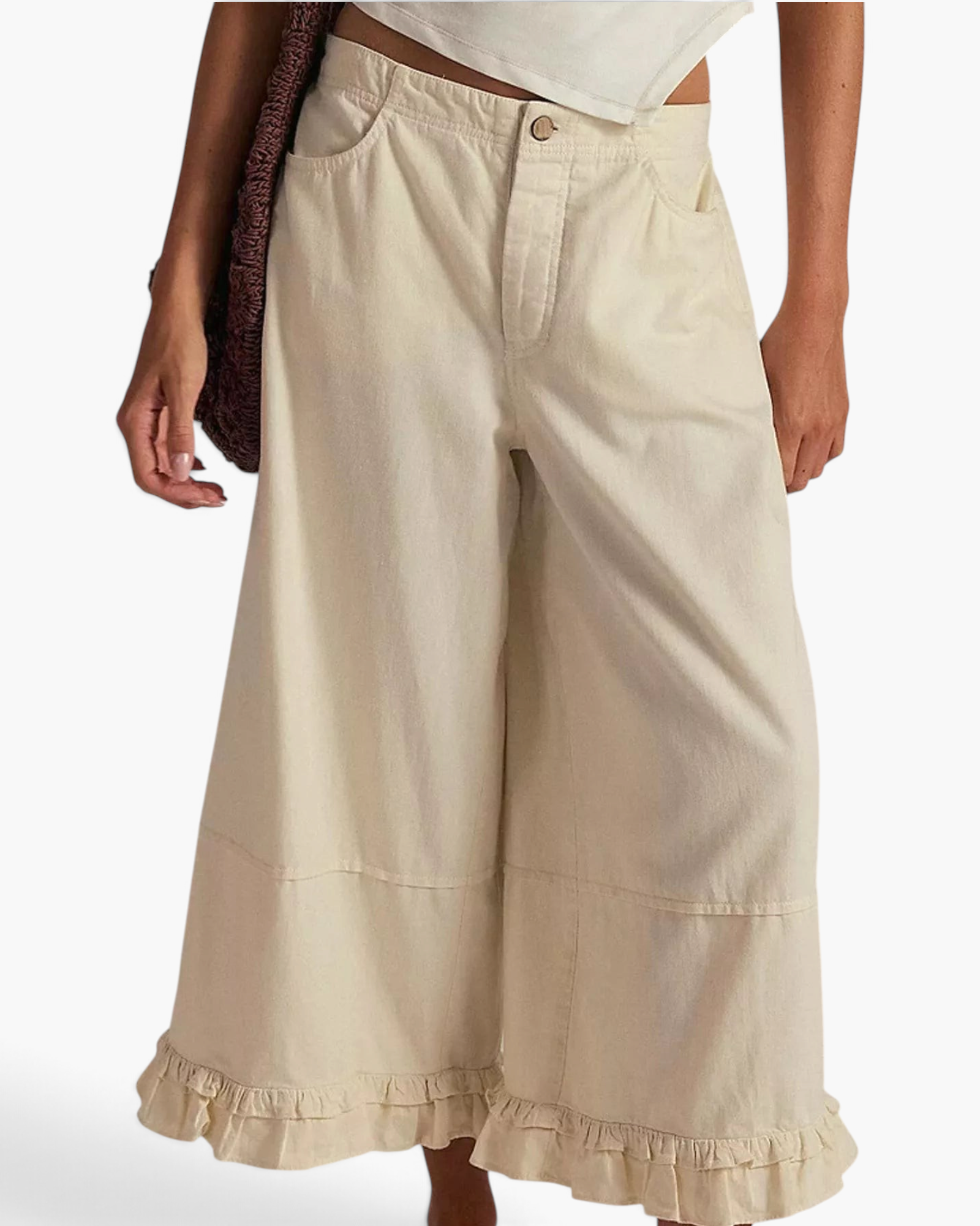 Beach Rose Co. cream denim wide leg cropped jeans featuring a gathered ruffle hem and front button closure.