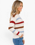 Beach Rose Co. cream knit sweater with multicolor stripes and speckles, featuring dropped shoulders and ribbed trim.