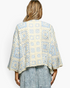 Beach Rose Co. ivory and light blue patchwork crochet open-front cardigan with relaxed three-quarter sleeves
