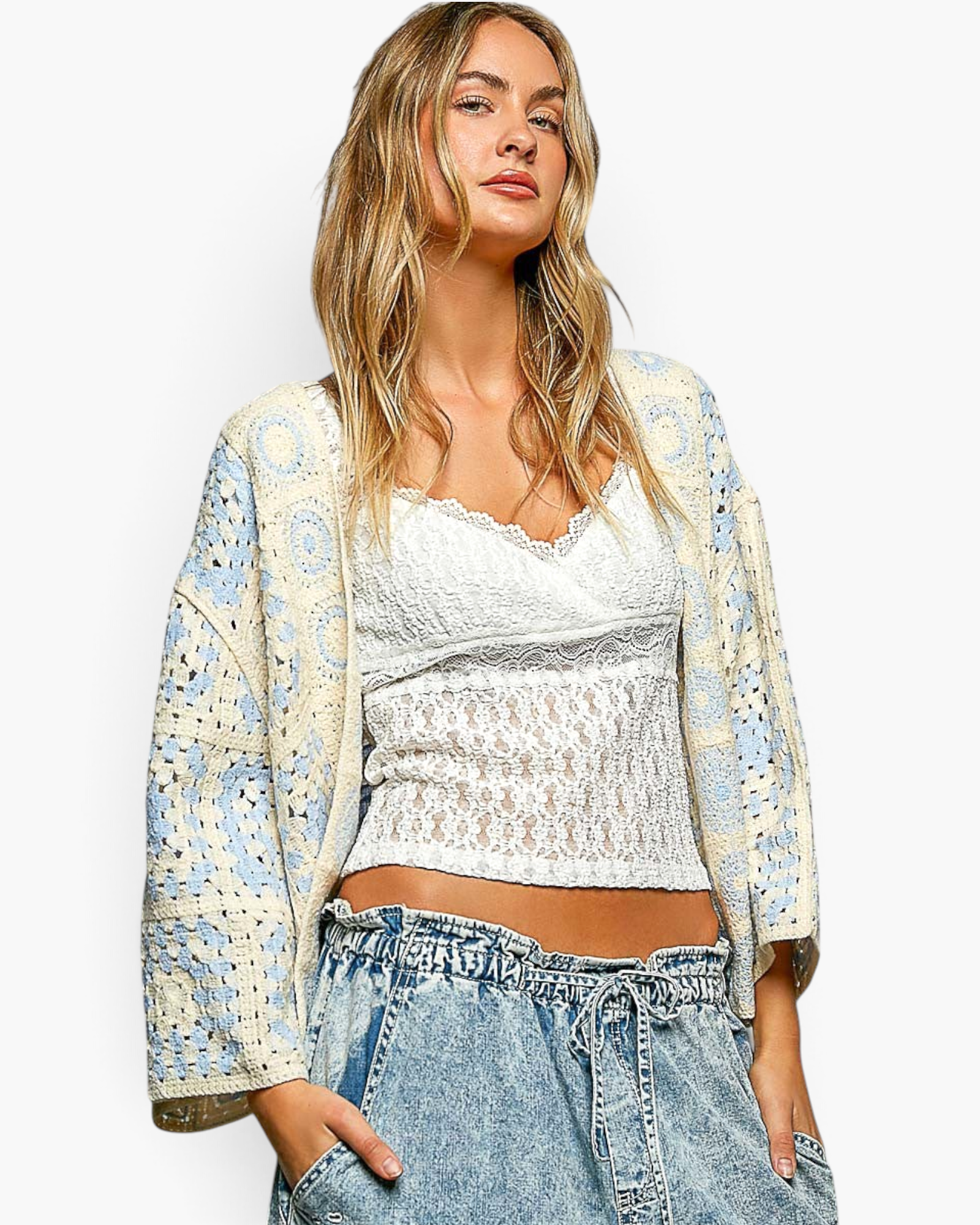 Beach Rose Co. ivory and light blue patchwork crochet open-front cardigan with three-quarter sleeves on a model