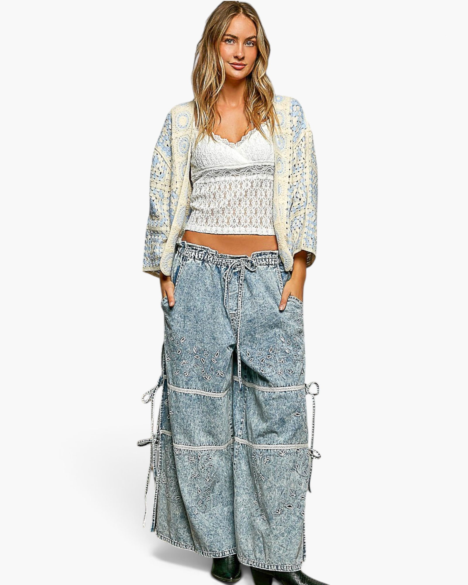 Beach Rose Co. ivory and light blue patchwork crochet open-front cardigan worn by a model with lace tank and jeans