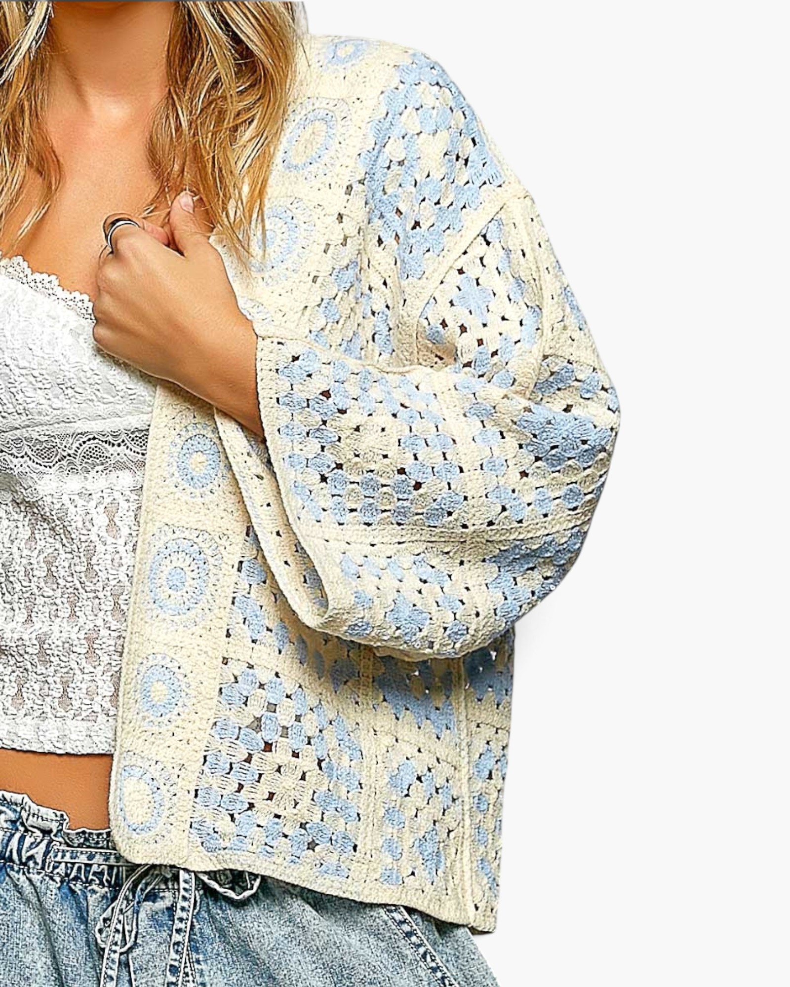Beach Rose Co. ivory and light blue patchwork crochet open-front cardigan with relaxed three-quarter sleeves.