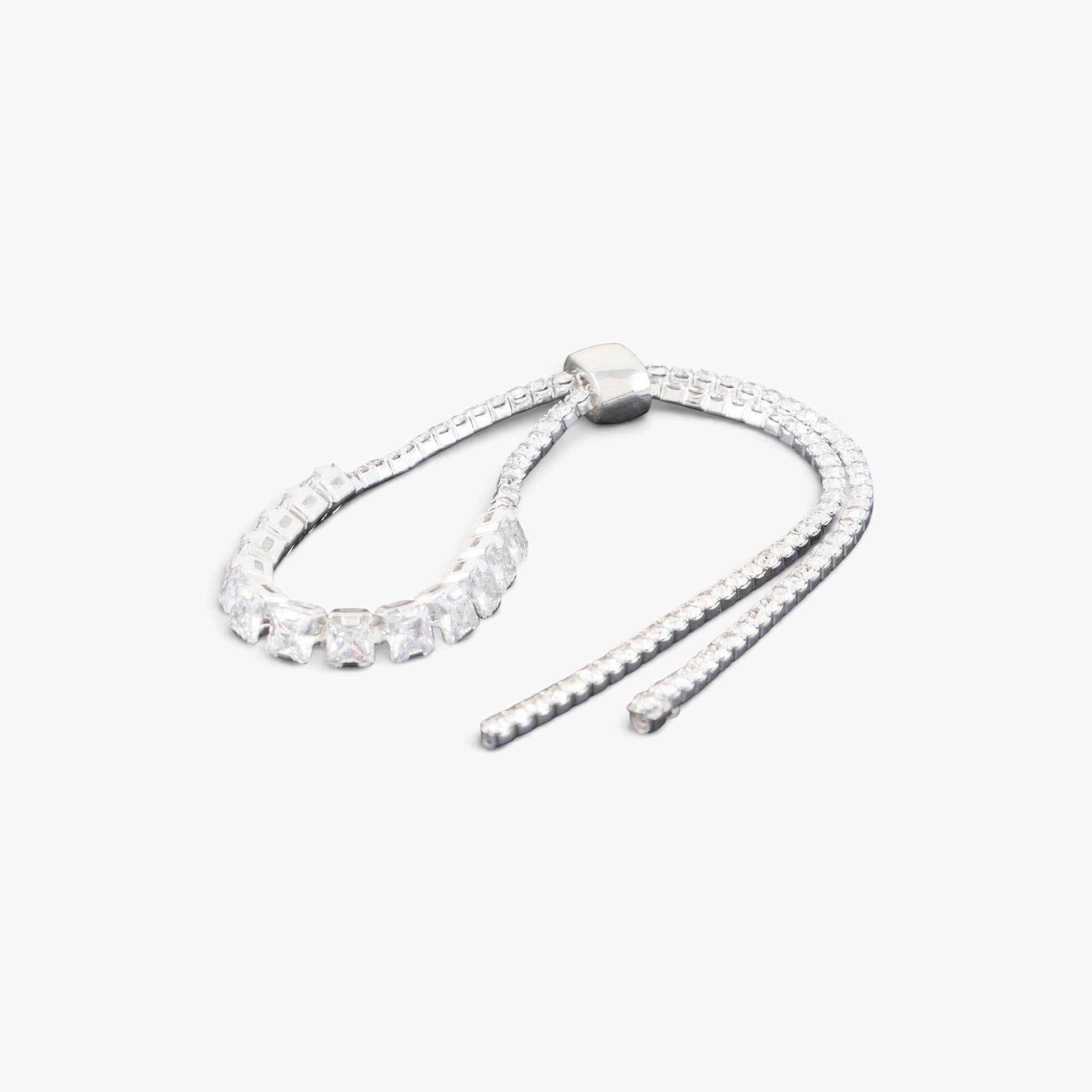 Beach Rose Co. silver tennis bracelet with clear square-cut cubic gemstones and an adjustable slider closure.