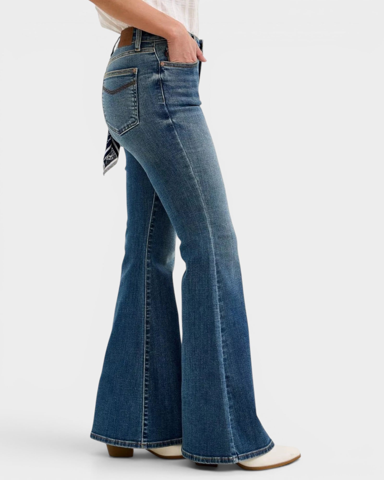 Beach Rose Co. dark wash denim flare jeans with bandana loop accent and triple-needle stitched pockets.