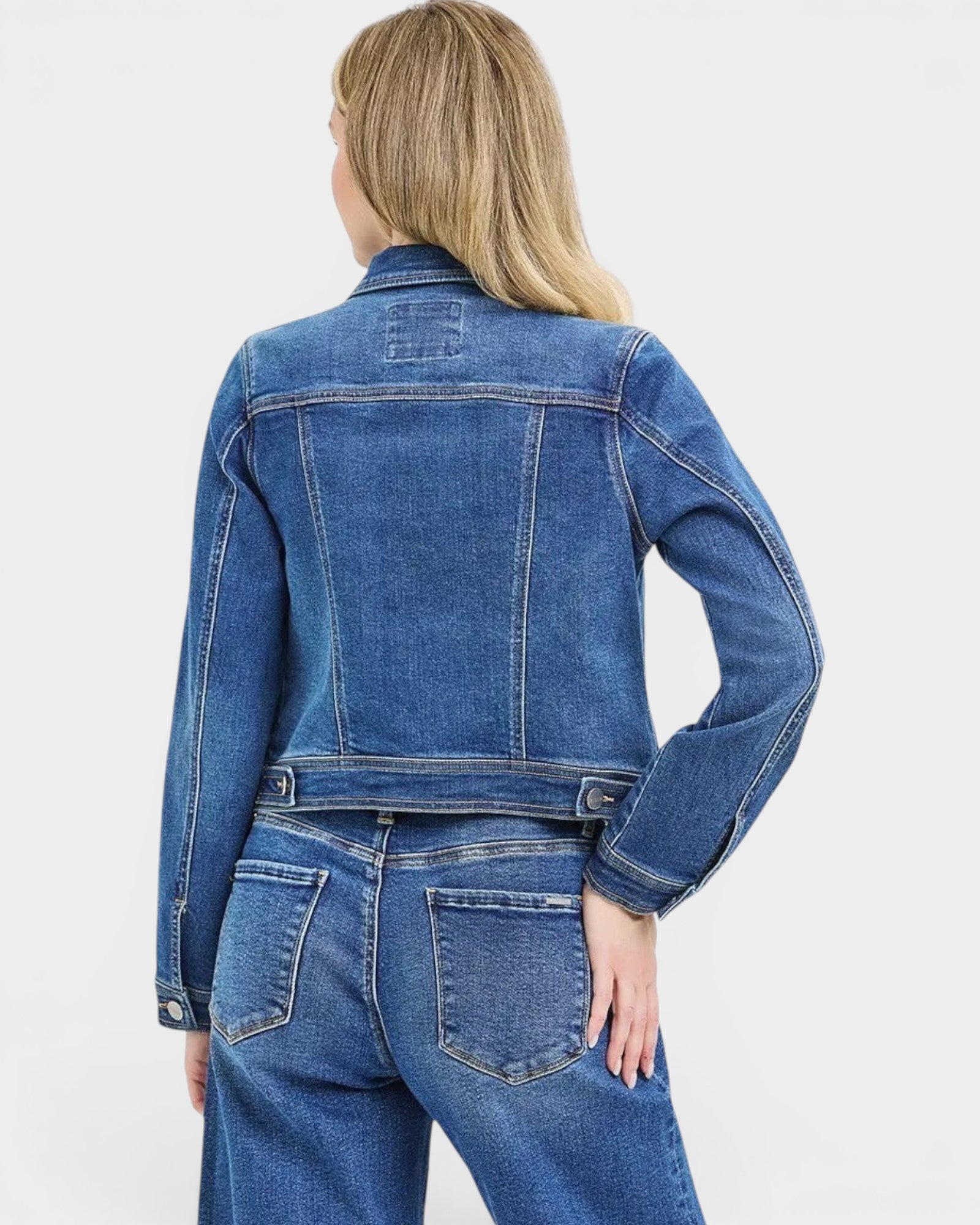 Beach Rose Co. dark wash cropped denim jacket with collared neckline and button front, made from stretch cotton blend.