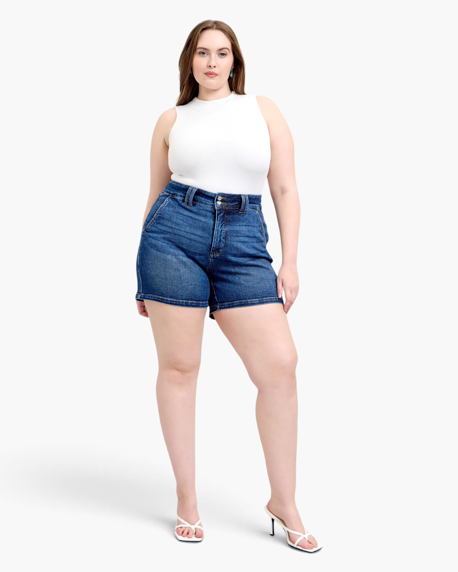 Beach Rose Co. dark wash denim shorts with a wide double-button waistband worn by a model in a white tank top.