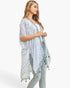 Beach Rose Co. multi dash pattern kimono with tassel trim worn by a model in a flowy, lightweight polyester fabric.