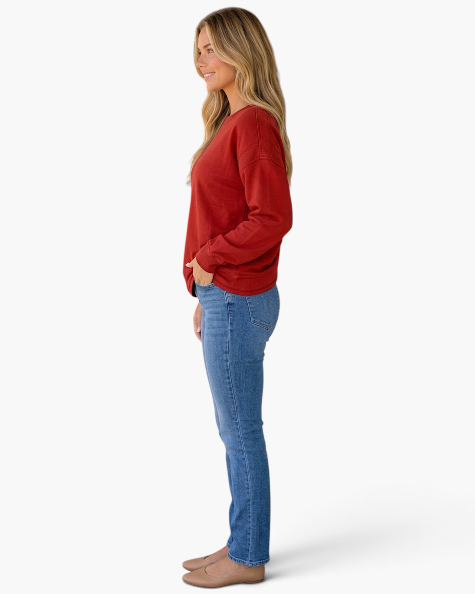 Beach Rose Co. deep red relaxed fit sweatshirt with long sleeves and ribbed cuffs worn by a blonde model in profile.