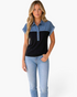 Beach Rose Co. Madisson short sleeve polo top featuring a denim patchwork collar and black cotton-blend body.