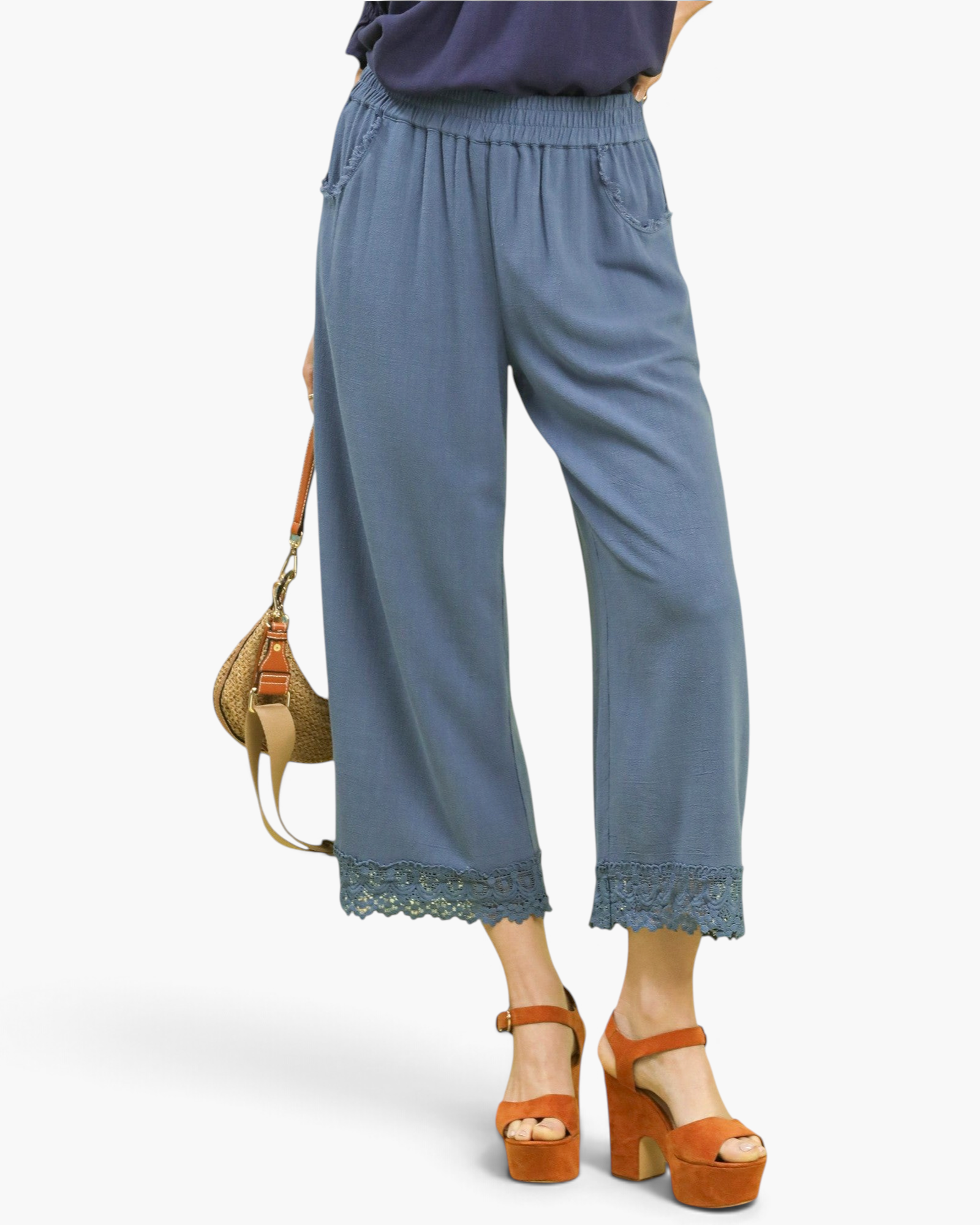 Beach Rose Co. dusty blue wide-leg cropped linen blend pants with scalloped lace hems and frayed pocket detail