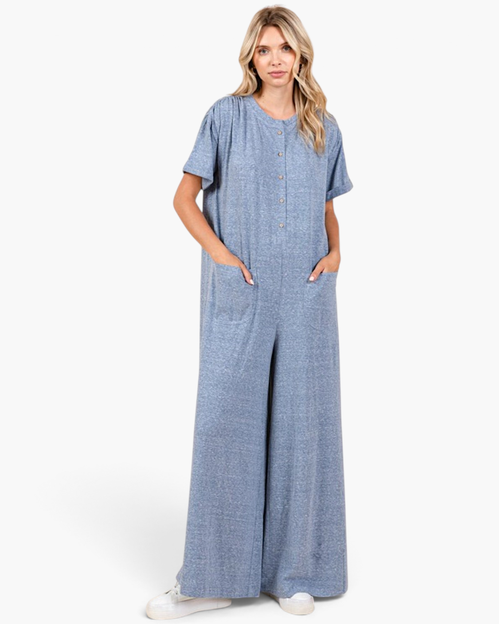 Beach Rose Co. dusty blue wide-leg jumpsuit with button-front, short sleeves, and patch pockets on a model
