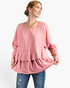 Beach Rose Co. dusty rose cotton tunic with dolman sleeves, lace trim, and a tiered ruffle hem on a smiling model