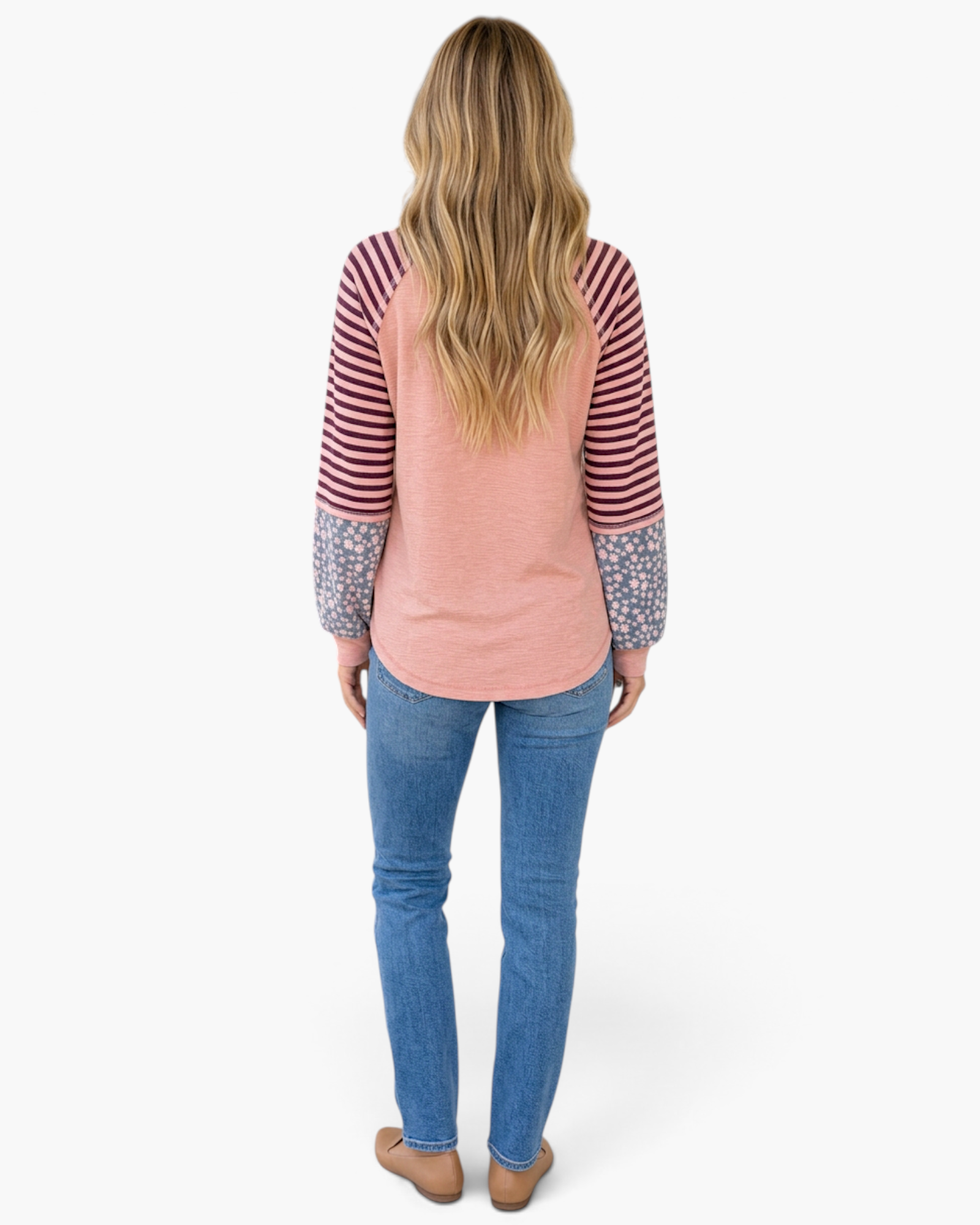 Beach Rose Co. dusty rose raglan top with mixed stripe and floral print long sleeves, shown from the back.
