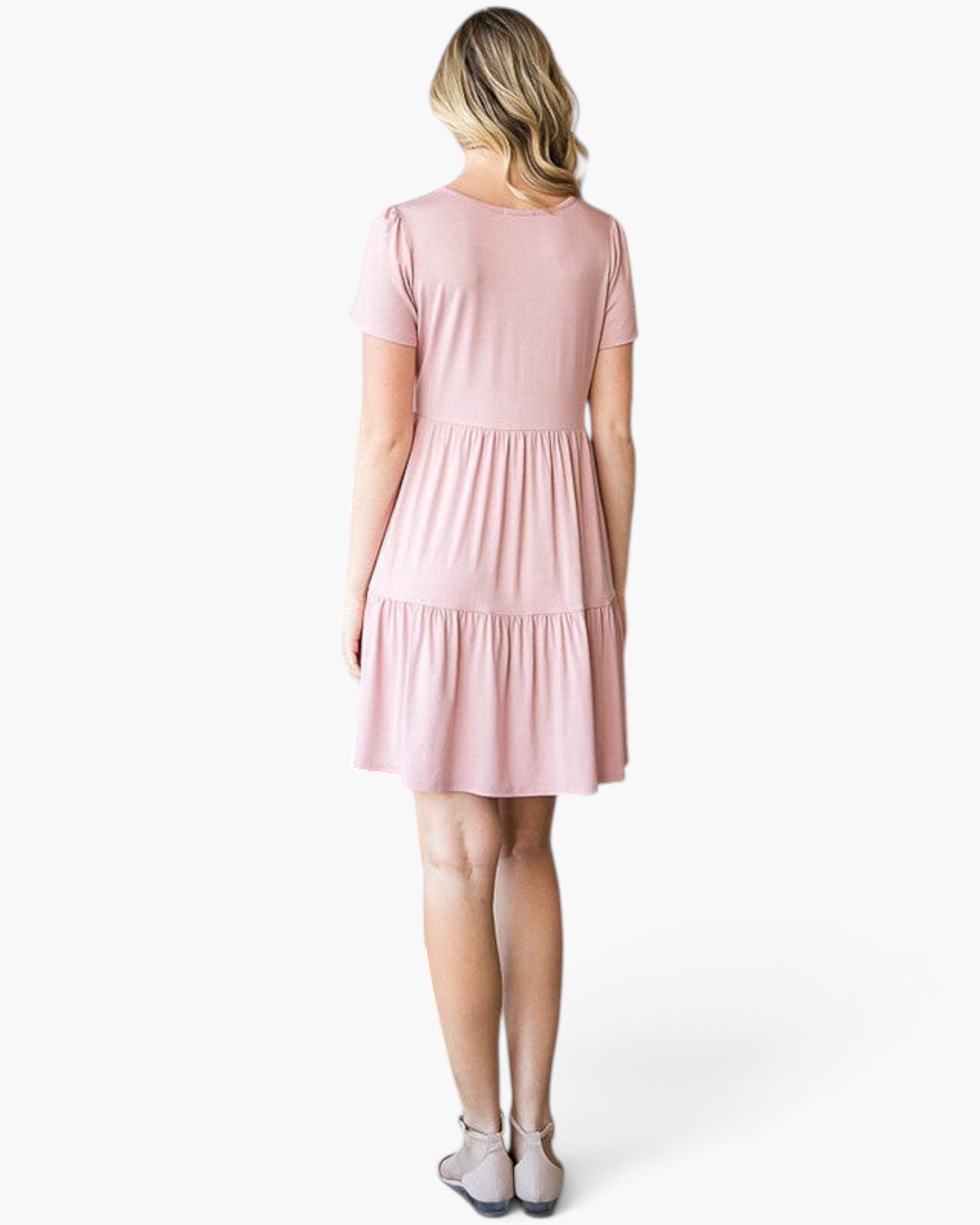 Back view of a Beach Rose Co. dusty rose tiered babydoll dress with short sleeves on a blonde model.
