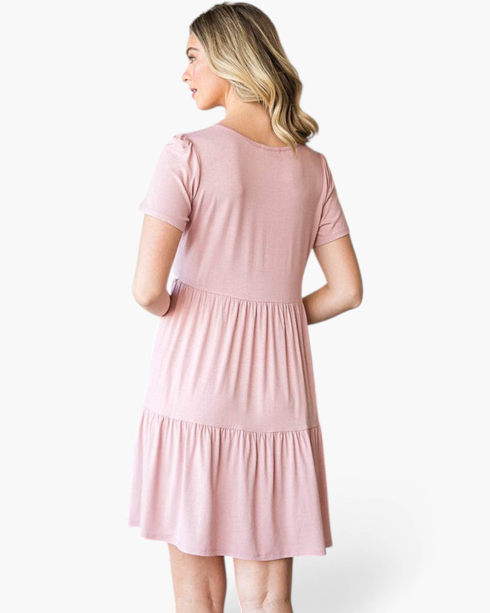Beach Rose Co. dusty rose babydoll dress with short sleeves and a tiered skirt, shown from the back.