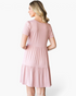 Beach Rose Co. dusty rose babydoll dress with short sleeves and a tiered skirt, shown from the back.
