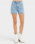 Beach Rose Co. light wash denim shorts with white embroidered floral details, high-rise fit, and short length.