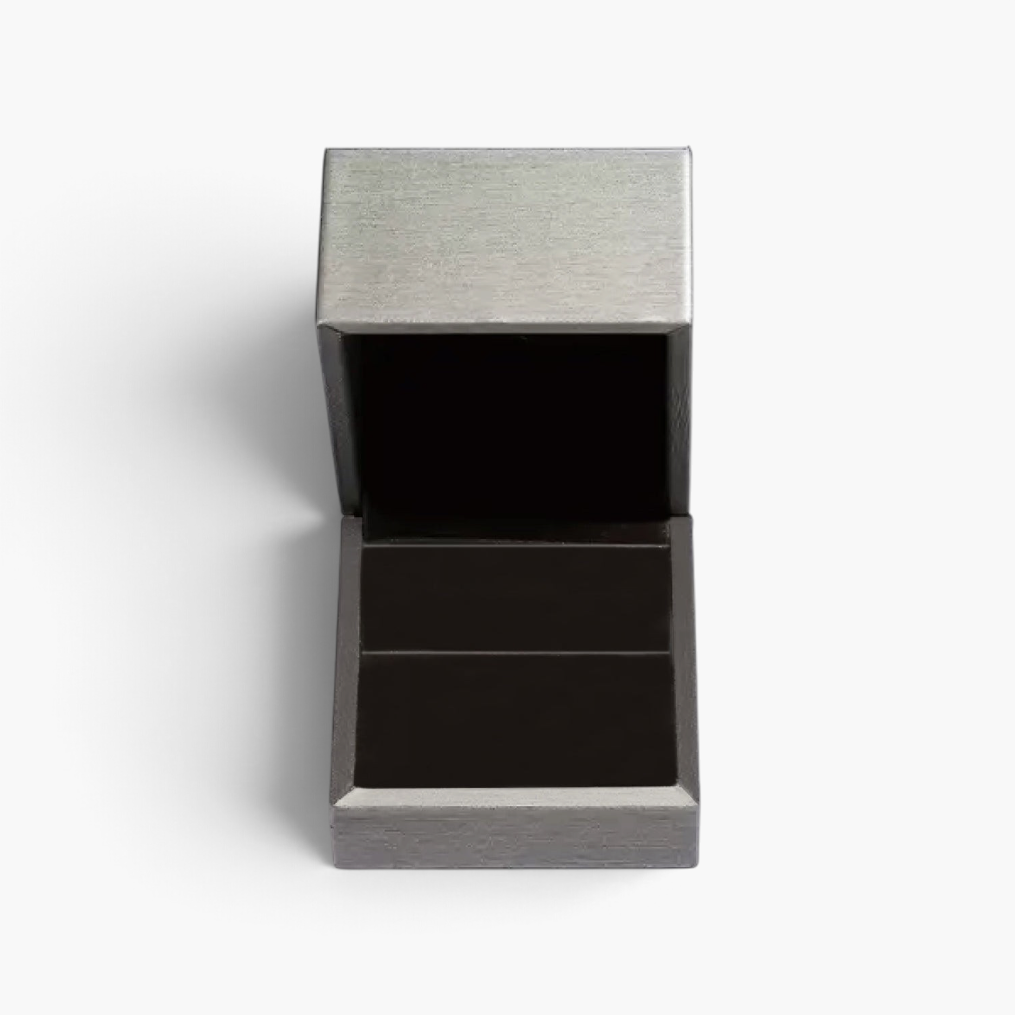 Beach Rose Co. empty dark grey textured jewelry gift box with a hinged lid open on a white background