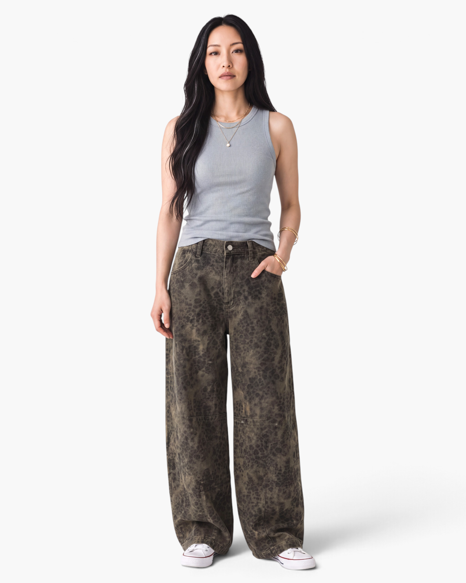Beach Rose Co. relaxed barrel-leg jeans in faded olive print with seamed details and front scoop pockets.