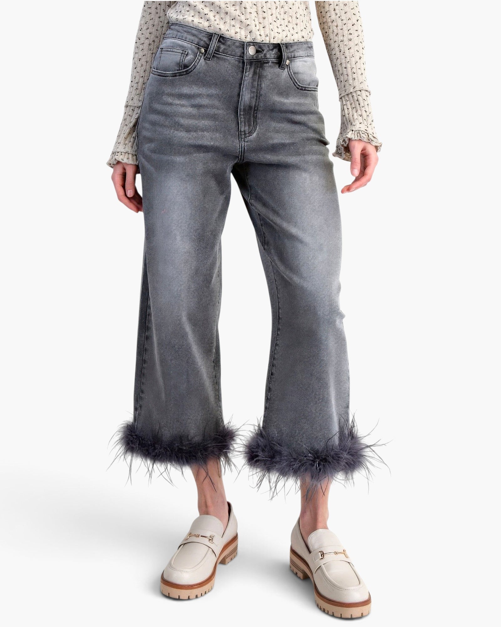 Beach Rose Co. high-waisted washed grey stretch denim pants with a cropped straight-leg fit and bold feather trim hem.