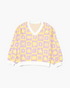 Beach Rose Co. plus size lavender and yellow floral checkerboard V-neck sweater with white ribbed trim.