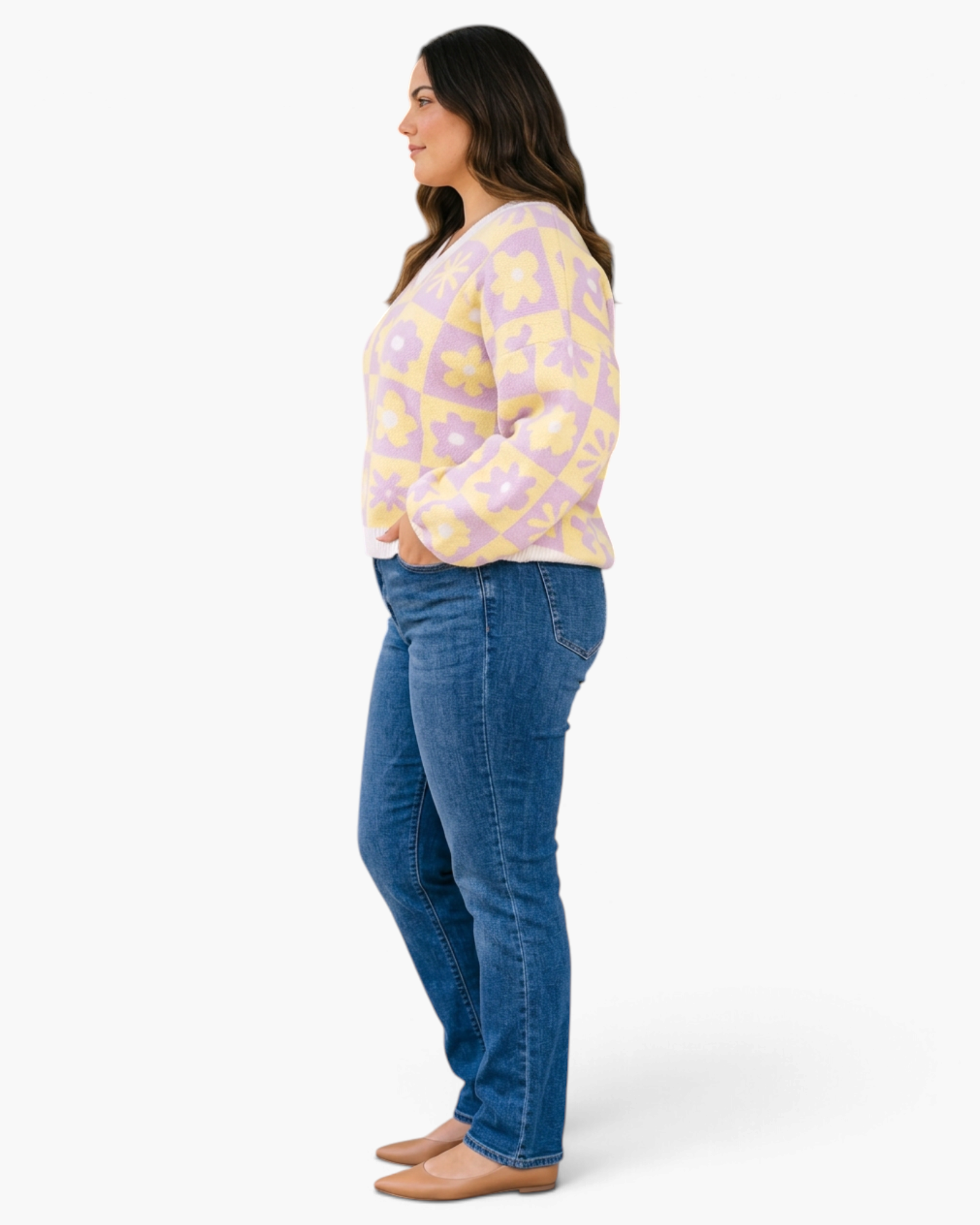 Beach Rose Co. plus size lavender and yellow floral checkerboard V-neck sweater with balloon sleeves on a model.
