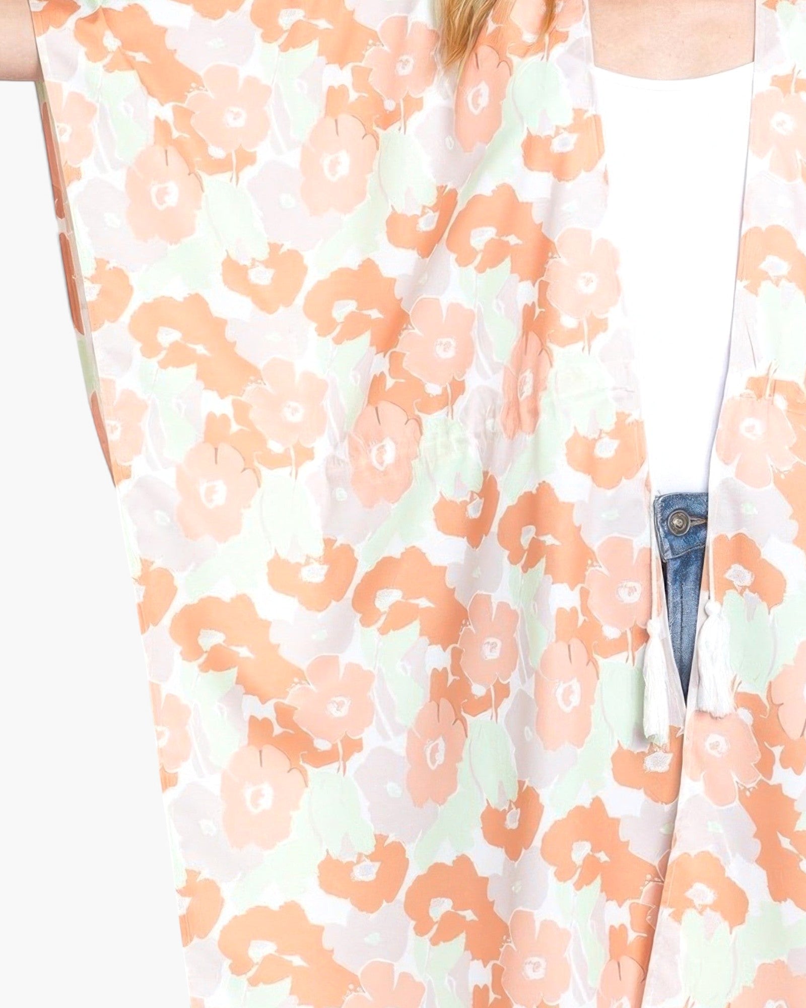 Beach Rose Co. floral print open front cover-up with a self-tie drawstring waist in soft peach and green tones.