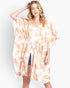 Beach Rose Co. floral print open-front cover-up with a drawstring waist worn by a blonde model on a white background.