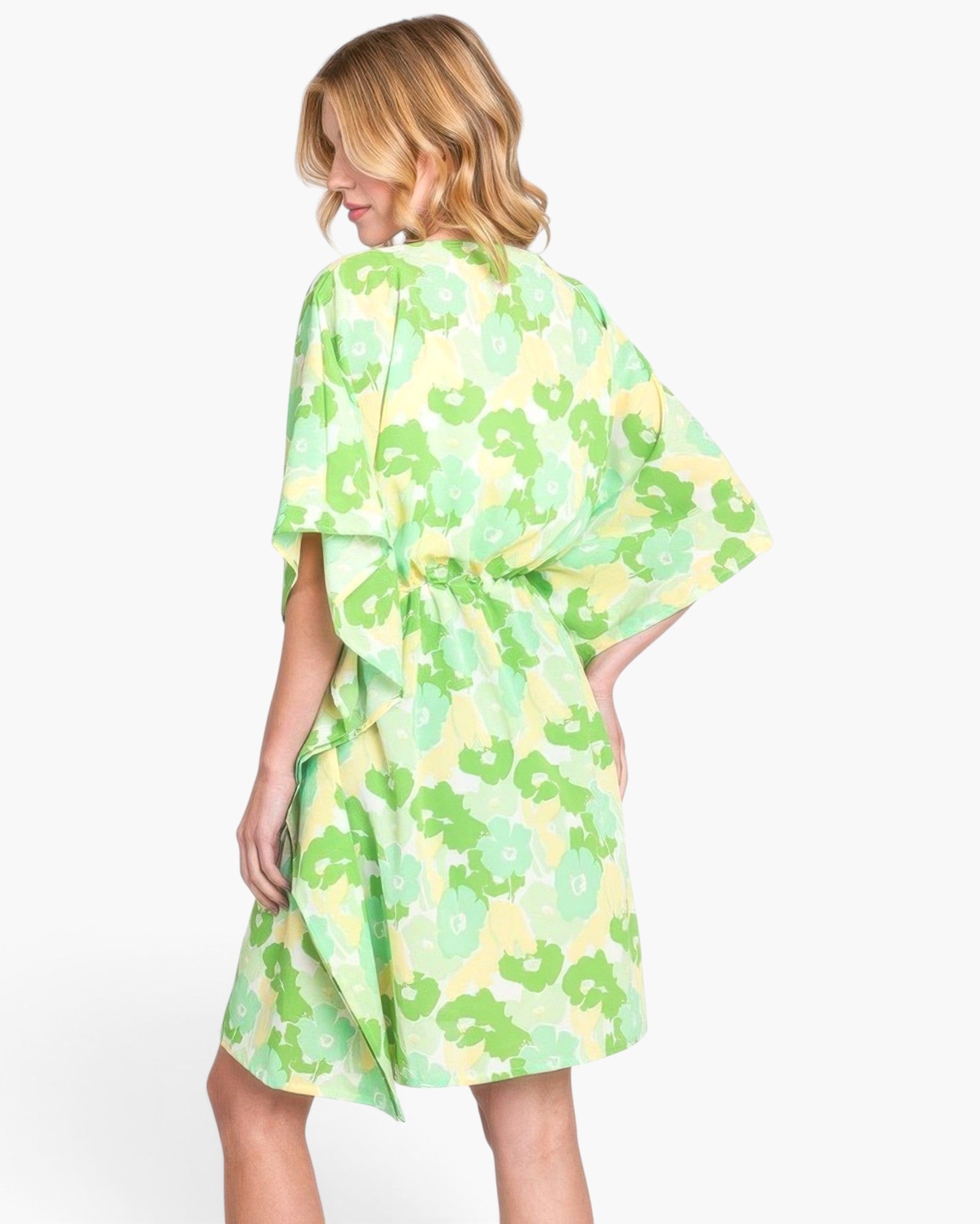 Beach Rose Co. floral print open-front cover-up with a drawstring waist worn by a blonde woman on a white background.