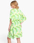 Beach Rose Co. floral print open-front cover-up with a drawstring waist worn by a blonde woman on a white background.