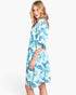 Beach Rose Co. floral print open-front cover-up with a self-tie drawstring waist worn by a blonde model